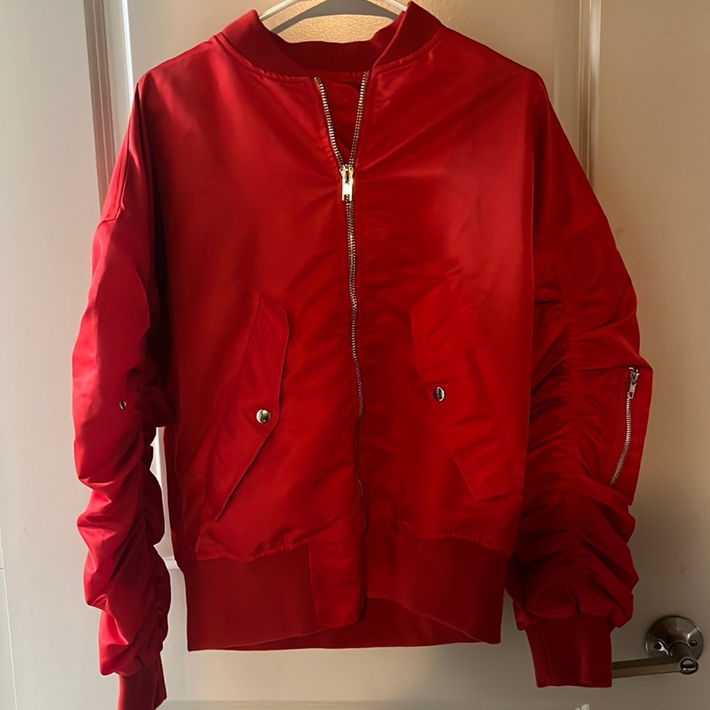 Bomber jacket with zipper design.
